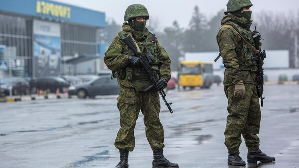 'Polite people' guard Simferopol Airport. February 28, 2014. - Sputnik International