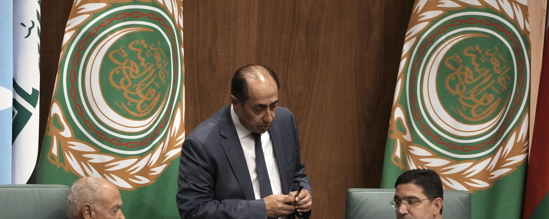 Secretary-General Ahmed Aboul Gheit, left, his deputy Hossam Zaki, center, listens to Moroccan Foreign Minister Nasser Bourita, during an extraordinary Arab foreign ministers meeting at the Arab League headquarters in Cairo, Egypt, Wednesday, Oct. 11, 2023, to discuss the ongoing Israel-Hamas war. - Sputnik International, 1920, 03.03.2024