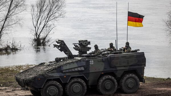 German soldiers in an armoured vehicle as they take part in NATO DRAGON 2024 military exercise in Korzeniewo, Northern Poland, March 4, 2024.  - Sputnik International