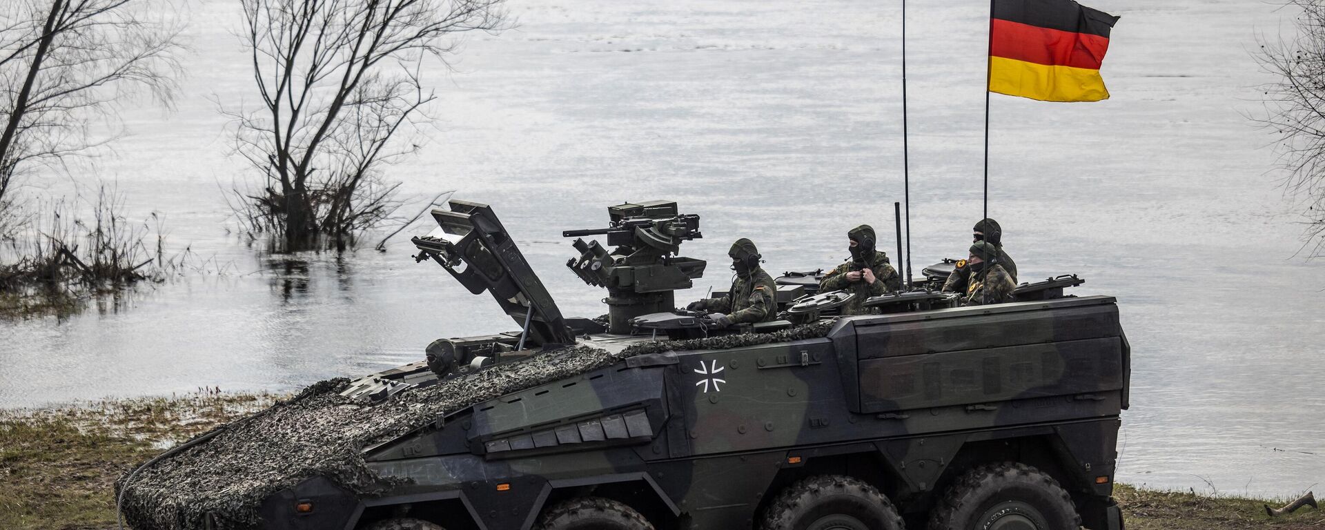 German soldiers in an armoured vehicle as they take part in NATO DRAGON 2024 military exercise in Korzeniewo, Northern Poland, March 4, 2024.  - Sputnik International, 1920, 20.03.2024