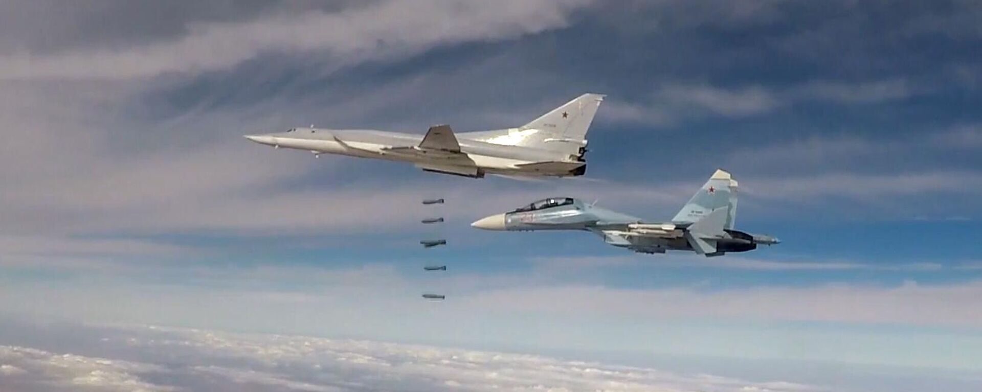 The Tu-22M3 long-range strategic bomber strikes facilities of the terrorist group, the Islamic State (The terrorist organization prohibited in Russia), in Syria. A screenshot from the video provided by the Russian Defense Ministry. - Sputnik International, 1920, 07.03.2024