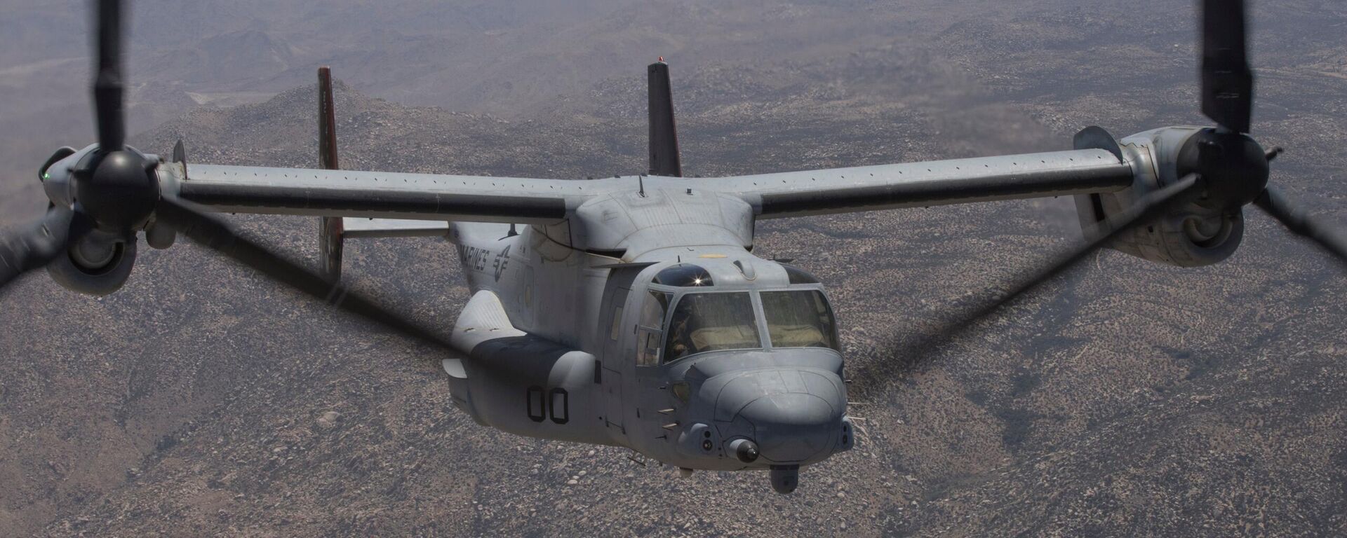In this photo provided by U.S. Marine Corps/3rd MAW, an MV-22B Osprey with Marine Operational Test and Evaluation Squadron (VMX) 1 transports ordnance during an Expeditionary Advanced Base Operation (EABO) exercise to Old Highway 101 near Marine Corps Base Camp Pendleton, Calif., on May 25, 2022 - Sputnik International, 1920, 08.03.2024
