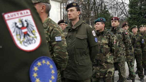 Soldiers from European countries, including Austria, Greece, Turkiye, Poland, Portugal and Finland, stand in a honour guard during the transfer of authority ceremony to mark the official Austrian takeover of command of the European Union peace force (EUFOR) in the northern part of Bosnia, at Eagle Base near Tuzla, 75 kms north of Sarajevo, Wednesday, Nov. 30, 2005 - Sputnik International