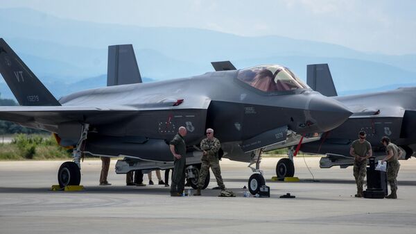Staff stand by two US Air Force F-35 Lightning II aircraft from the Vermont Air National Guard’s 134th Fighter Squadron. File photo - Sputnik International
