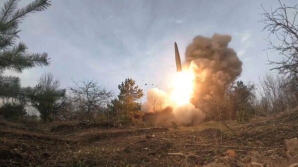 Combat launch of a missile from the Iskander operational-tactical missile system to destroy hangars with military equipment and ammunition of the Ukrainian Armed Forces during a special military operation. - Sputnik International