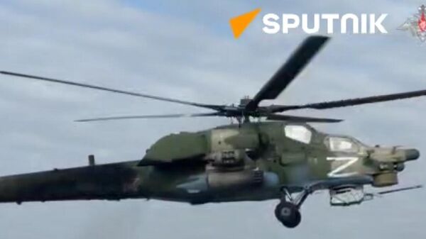 Russian Mi-28 helicopters carry out strikes on enemy strongholds and manpower - Sputnik International