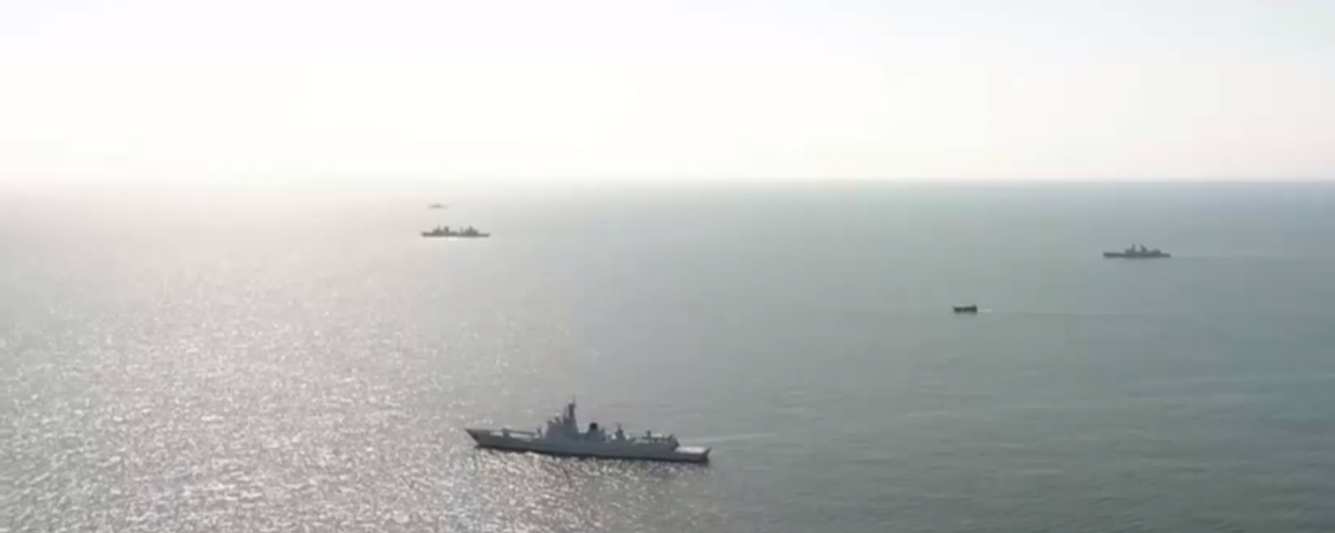 Russia, Iran and China stage week-long large-scale drills in the Gulf of Oman and the northern Indian Ocean. Screenshot of Russian Defense Ministry video. - Sputnik International, 1920, 13.03.2024