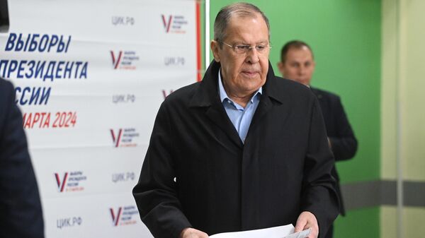 Russian Foreign Minister Sergey Lavrov votes at the country's presidential elections. March 15, 2024. - Sputnik International