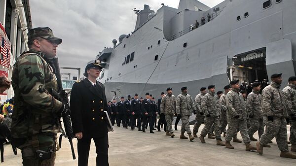 Troops parade during a ceremony for the new Navy assault ship USS New York, built with World Trade Center steel, marking its arrival in New York, Monday Nov. 2, 2009 - Sputnik International