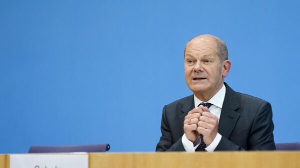 German Finance Minister Olaf Scholz briefs the media about the budget 2022 during a news conference in Berlin, Germany, Wednesday, June 23, 2021 - Sputnik International