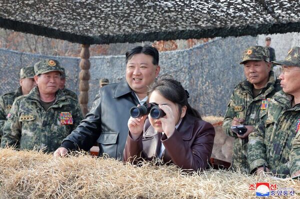 Kim Jong Un along with his daughter inspecting the readiness of the soldiers participating in the drills. - Sputnik International