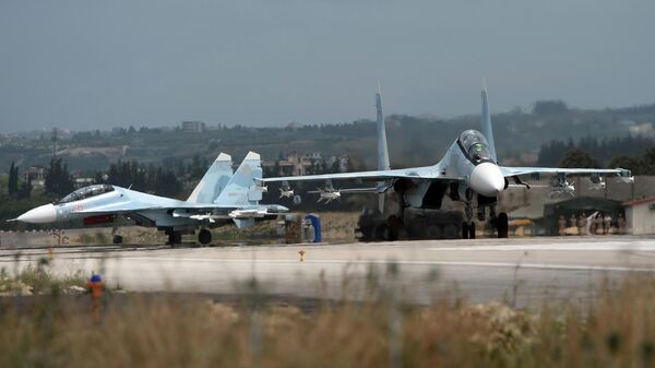 Russian Su-30 fighter jets before a takeoff at the Hmeimim airbase in Syria. - Sputnik International