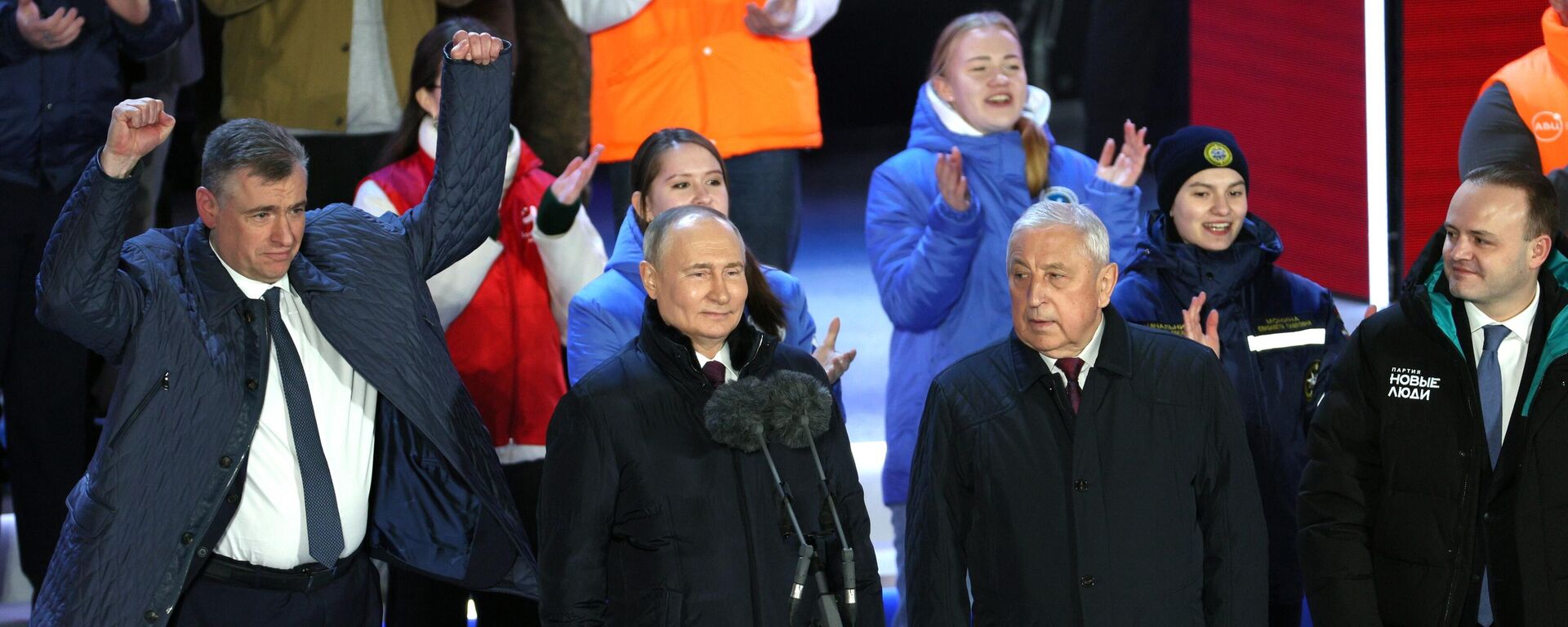 Russian President Vladimir Putin and presidential candidates Leonid Slutsky, Nikolai Kharitonov and Vladislav Davankov attend a rally-concert dedicated to the tenth anniversary of Crimea's reunification with Russia in Red Square, in Moscow, Russia - Sputnik International, 1920, 19.03.2024