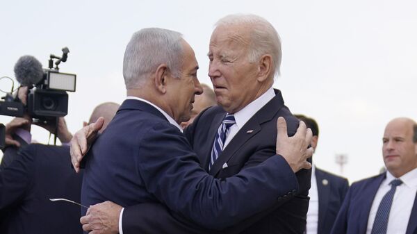 President Joe Biden is greeted by Israeli Prime Minister Benjamin Netanyahu after arriving at Ben Gurion International Airport, on Oct. 18, 2023, in Tel Aviv - Sputnik International