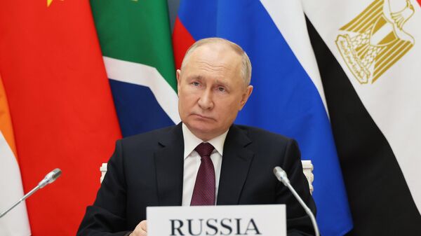 Russian President Vladimir Putin takes part, via videoconference, in an extraordinary BRICS summit to discuss the Palestinian-Israeli conflict, at the Kremlin in Moscow, Russia - Sputnik International