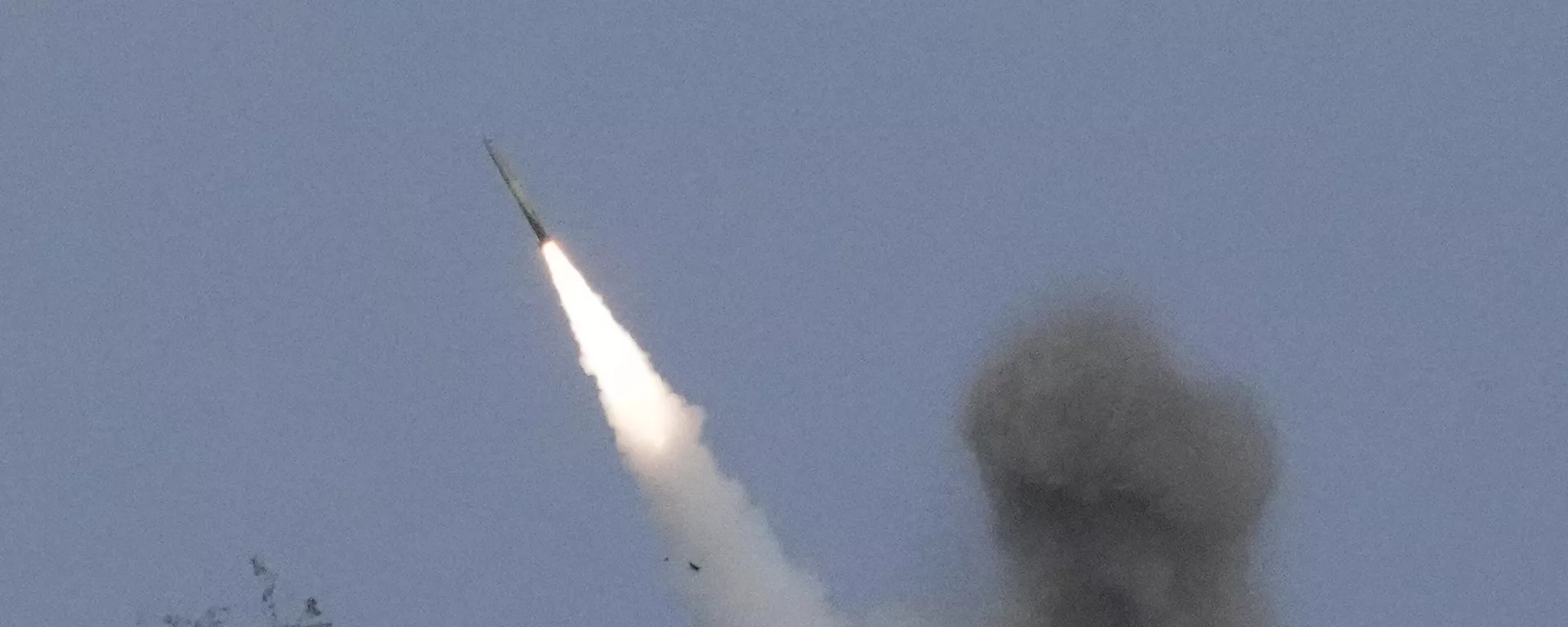 A US M142 High Mobility Artillery Rocket System (HIMARS) fires a missile during a Combined Joint Littoral Live Fire Exercise at the joint military exercise called Balikatan, Tagalog for shoulder-to-shoulder in a Naval station in Zambales province, northern Philippines on Wednesday, April 26, 2023 - Sputnik International, 1920, 07.07.2024