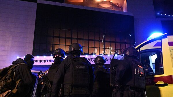 Russian law enforcement officers at the Crocus City Hall in Moscow. March 22, 2024 - Sputnik International