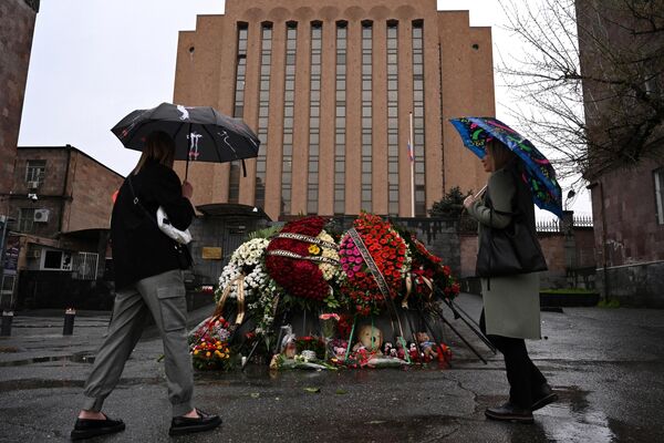 People mourn at a makeshift memorial in front of the Russian Embassy in Armenia&#x27;s Yerevan.  - Sputnik International