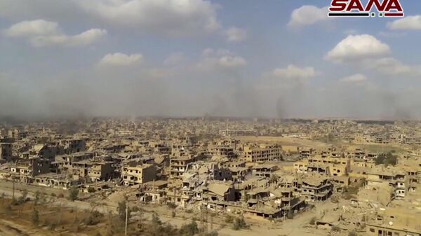 This frame grab from a video released on Nov. 2, 2017 by the Syrian official news agency SANA shows the destroyed in the Deir el-Zour city during a battle against Islamic State militants, Syria - Sputnik International