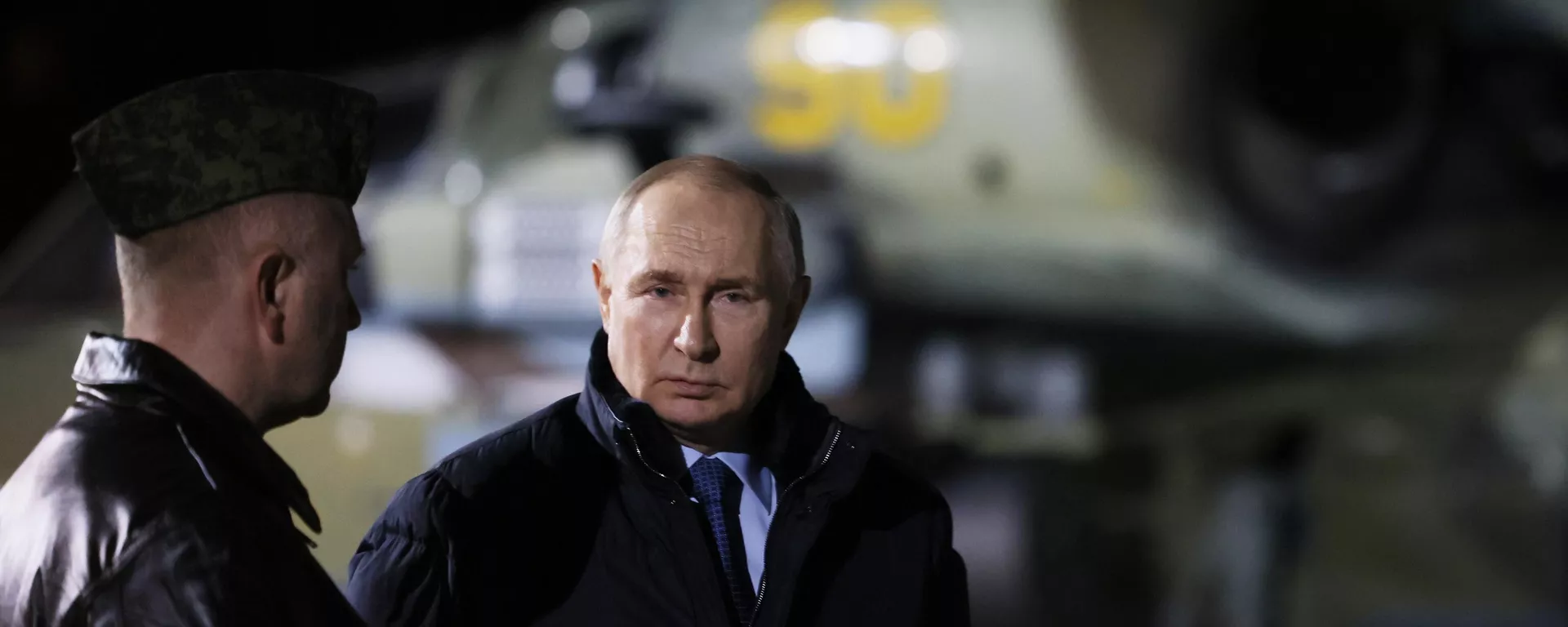 Russian President Vladimir Putin visits the State Centre for Deployment and Retraining of Flight Personnel of the Russian Defence Ministry in Torzhok, Tver region, Russia. Hero of Russia, head of aerial weapons training and tactical training of the centre, Alexander Karamyshev, is on the left. File photo. - Sputnik International, 1920, 06.05.2024