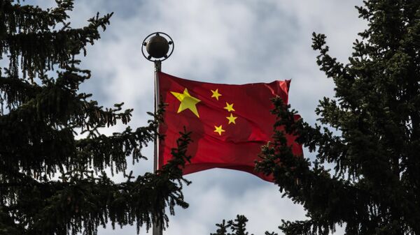 Chinese national flag at the Chinese Embassy in the Russian Federation in Moscow - Sputnik International