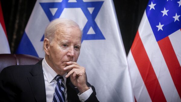 U.S. President Joe Biden pauses during a meeting with Israeli Prime Minister Benjamin Netanyahu to discuss the war between Israel and Hamas, in Tel Aviv, Israel, Wednesday, Oct. 18, 2023 - Sputnik International