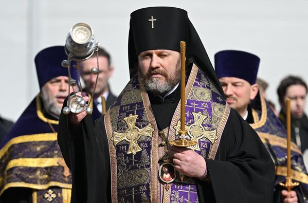 Russian Orthodox Archbishop Foma holds a requiem liturgy for the victims of the terrorist attack at Crocus City Hall. - Sputnik International
