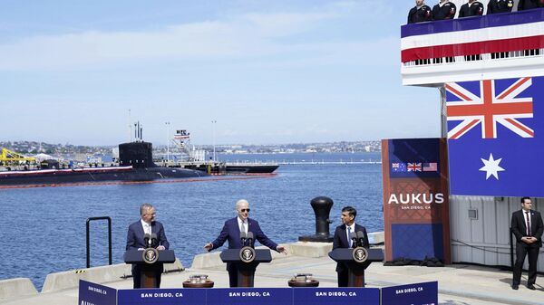 Britain's Prime Minister Rishi Sunak, right, meets with US President Joe Biden and Prime Minister of Australia Anthony Albanese, left, at Point Loma naval base in San Diego, US, Monday March 13, 2023, as part of Aukus, a trilateral security pact between Australia, the UK, and the US. - Sputnik International