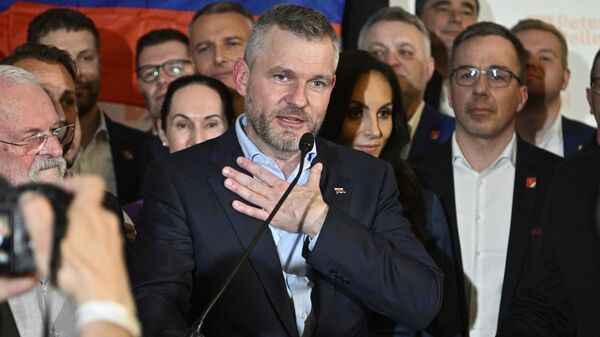 Presidential candidate Peter Pellegrini, centre, addresses supporters at his headquarters after a presidential runoff in Bratislava, Slovakia - Sputnik International
