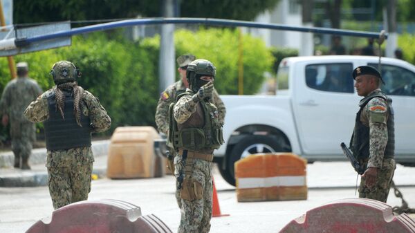 Army soldiers guard the surroundings of the Naval Hospital, where Ecuador's ex-vice president Jorge Glas was taken due to health issues after refusing to eat prison food according to prison authority, in Guayaquil, April 8, 2024. Ecuadoran special forces on April 5 forced their way into Mexico's embassy to grab Glas, who had taken refuge there since December, after an arrest warrant was issued against him for alleged corruption. Mexico had granted him political refugee status just hours before the raid.  - Sputnik International