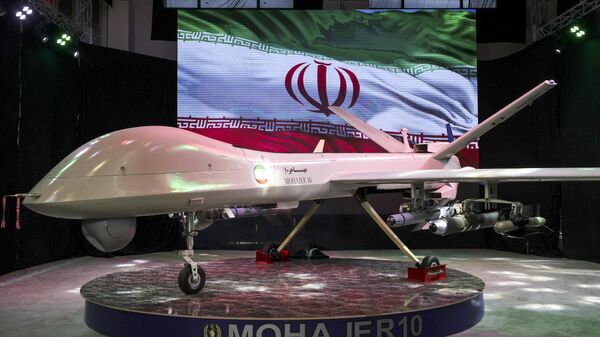 Iranian drone Mohajer 10 is displayed Iran's defence industry achievements exhibition, on August 23, 2023 in Tehran. Iran unveiled on August 22 its latest domestically built drone that can fly at a higher altitude and for a longer duration with enhanced weapons capabilities, local media reported. - Sputnik International