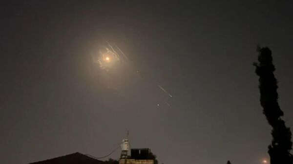 Video grab shows explosions lighting up Jerusalem sky during Iranian attack on Israel.  - Sputnik International
