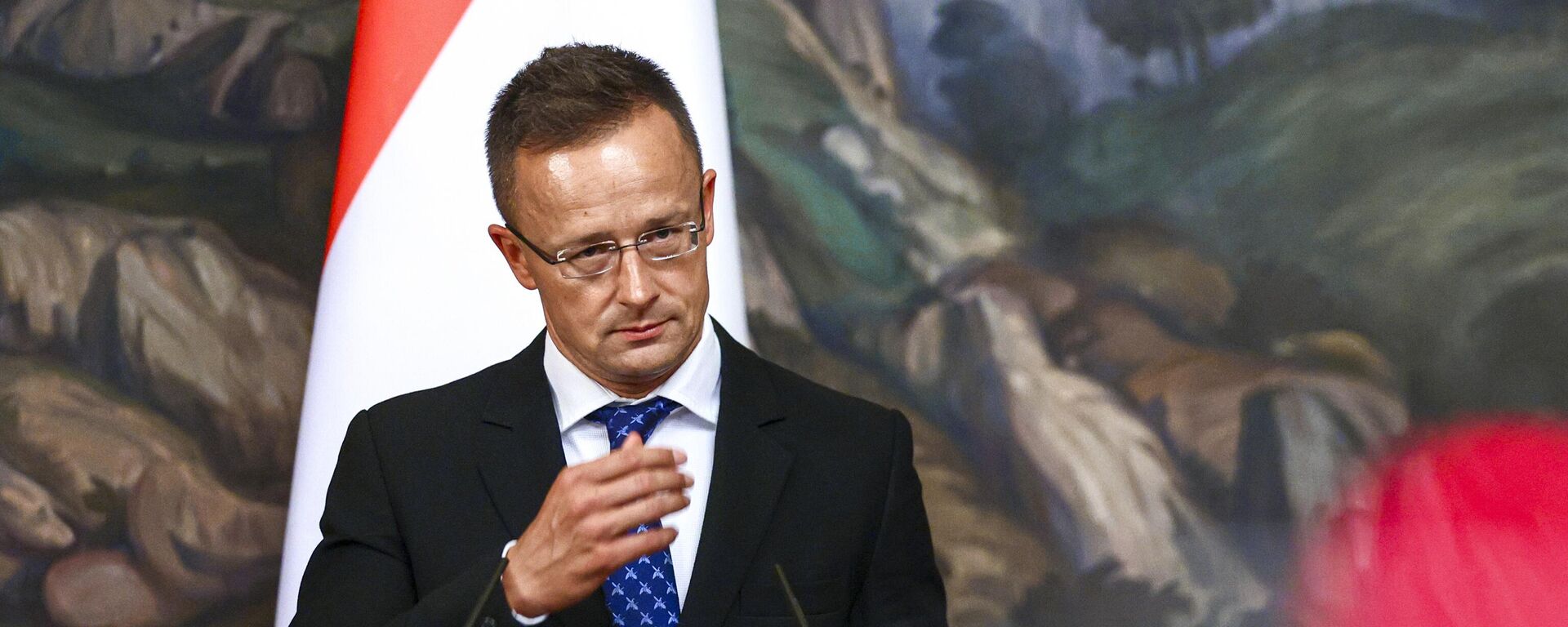 In this handout photo released by Russian Foreign Ministry Press Service, Hungary's Minister of Foreign Affairs and Trade Peter Szijjarto gestures while speaking to the media during a joint news conference with Russian Foreign Minister Sergey Lavrov following their talks in Moscow, Russia, Thursday, July 21, 2022 - Sputnik International, 1920, 25.01.2025