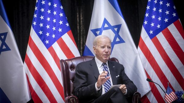 US President Joe Biden speaks during a meeting with Israeli Prime Minister Benjamin Netanyahu to discuss the war between Israel and Hamas, in Tel Aviv, Israel, Wednesday, Oct. 18, 2023 - Sputnik International