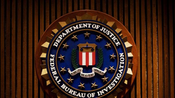 A crest of the Federal Bureau of Investigation is seen inside the J. Edgar Hoover FBI Building in Washington, DC. File photo - Sputnik International