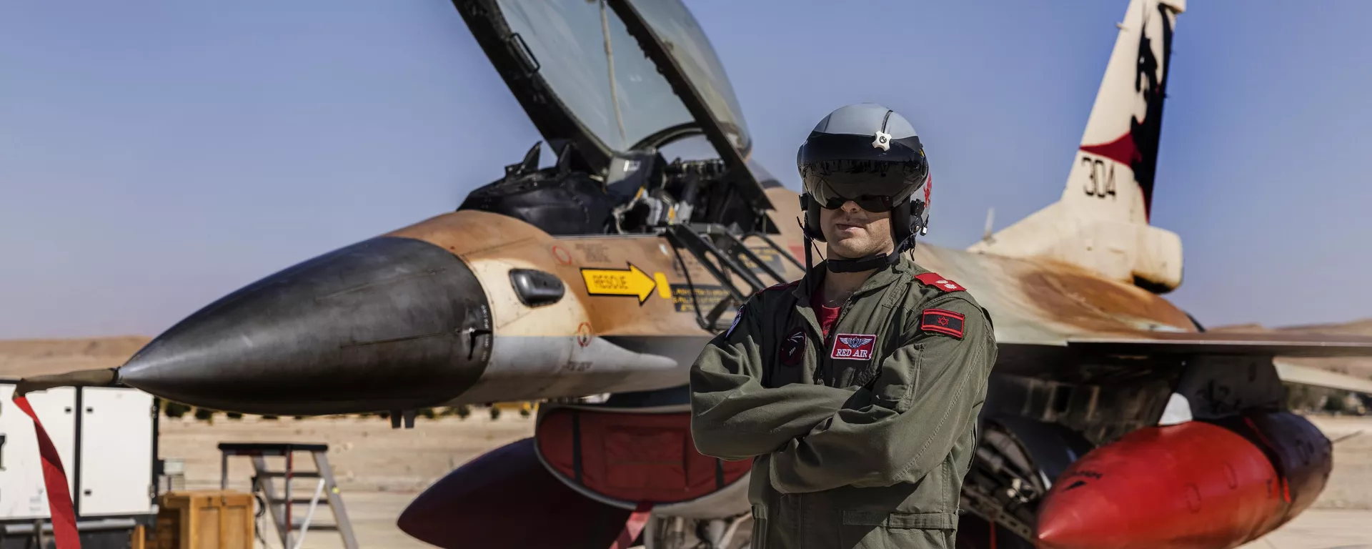 An Israeli F-16 pilot pose for a photo during the bi-annual multi-national aerial exercise known as the Blue Flag, at Ovda airbase near Eilat, southern Israel, Sunday, Oct. 24, 2021 - Sputnik International, 1920, 03.11.2024