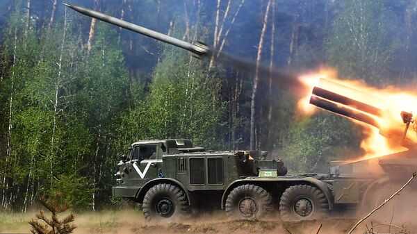 An Uragan 9K57 multiple rocket launcher fires in the Kharkov direction during the special military operation - Sputnik International