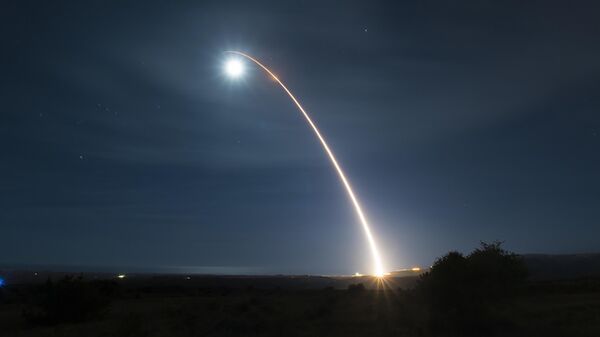 This photo provided by the US Air Force shows the launch of an unarmed Minuteman III intercontinental ballistic missile during a developmental test - Sputnik International