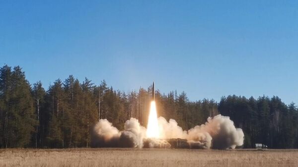 Iskander tactical missile launched towards Ukrainian positions - Sputnik International