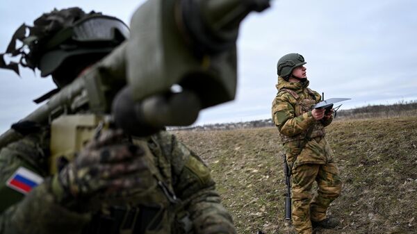 Russian soldiers in the zone of the special military operation in Ukraine. - Sputnik International
