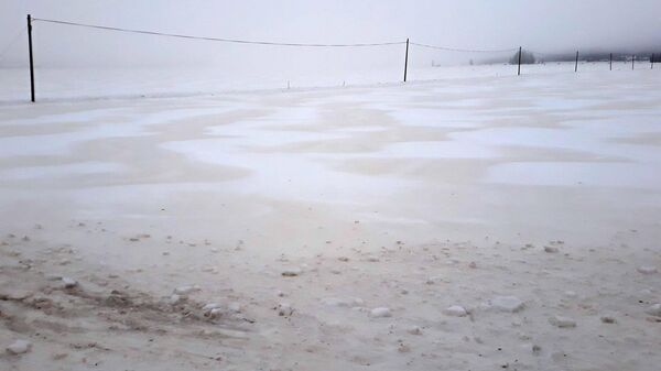 Sand from the Sahara desert has fallen on a snowy field in Kurikka, Finland, on February 25, 2021 - Sputnik International