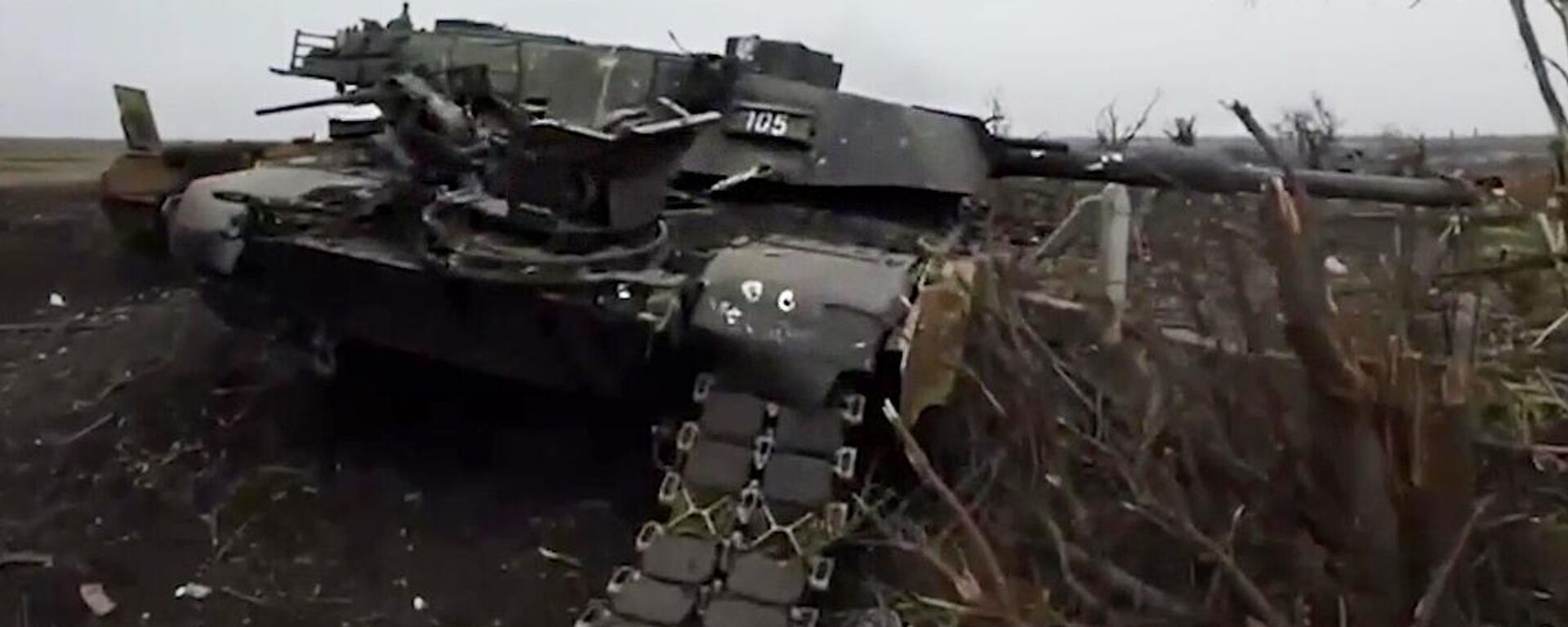 In this handout video grab released by the Russian Defence Ministry, a US-made Abrams tank used by the Ukrainian military, which was destroyed during fighting in the Avdeyevka area amid Russia's military operation in Ukraine, is seen in the field in the village of Berdychi, Donetsk People's Republic, Russia - Sputnik International, 1920, 27.04.2024