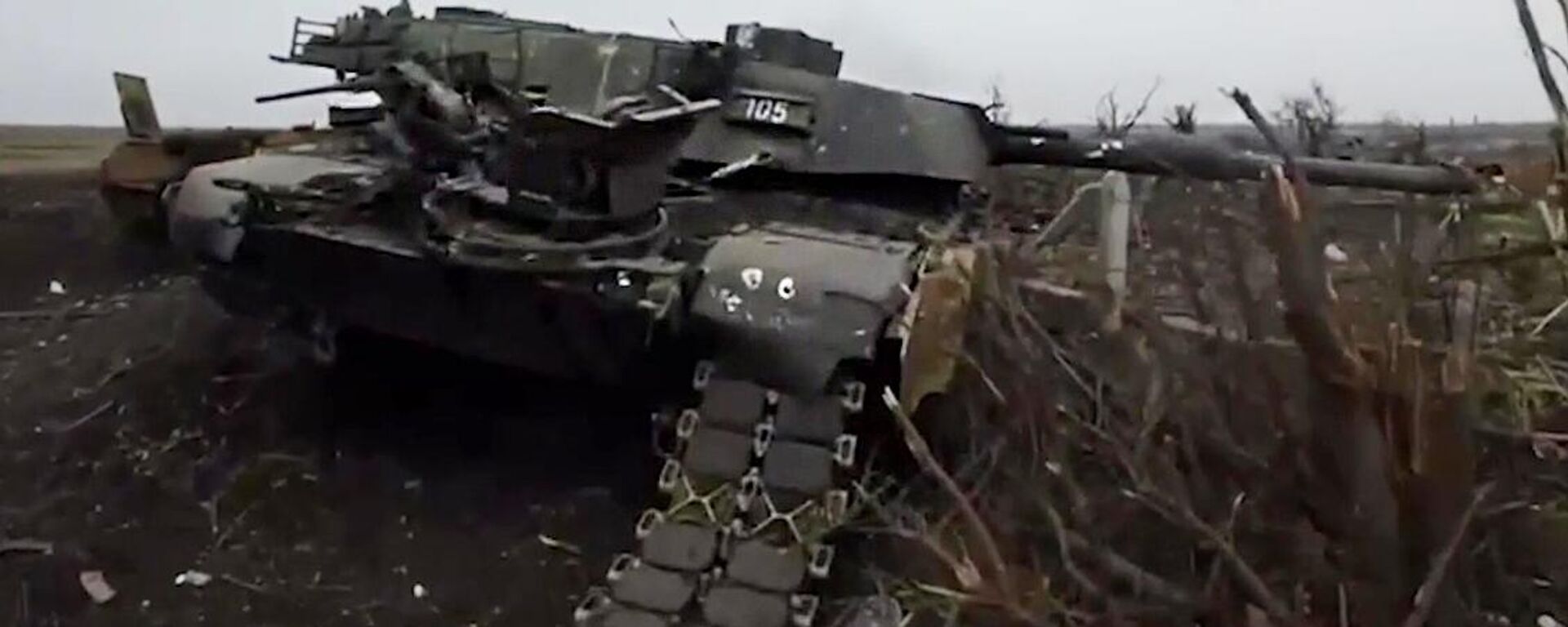 In this handout video grab released by the Russian Defence Ministry, a US-made Abrams tank used by the Ukrainian military, which was destroyed during fighting in the Avdeyevka area amid Russia's military operation in Ukraine, is seen in the field in the village of Berdychi, Donetsk People's Republic, Russia - Sputnik International, 1920, 27.04.2024