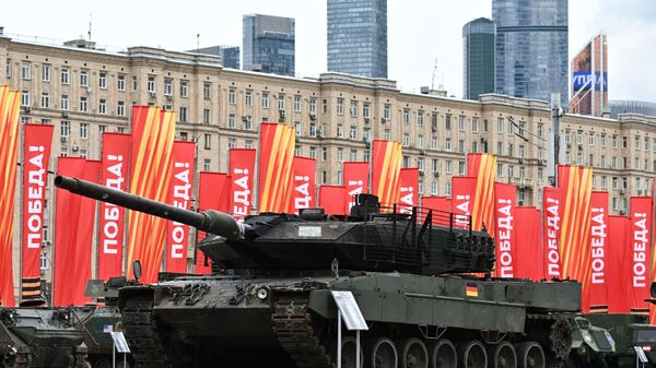 A German Leopard 2A6 main battle tank is pictured before the opening of an exhibition of foreign-made military equipment captured in the course of Russia's military operation in Ukraine, on Poklonnaya Hill in Moscow - Sputnik International