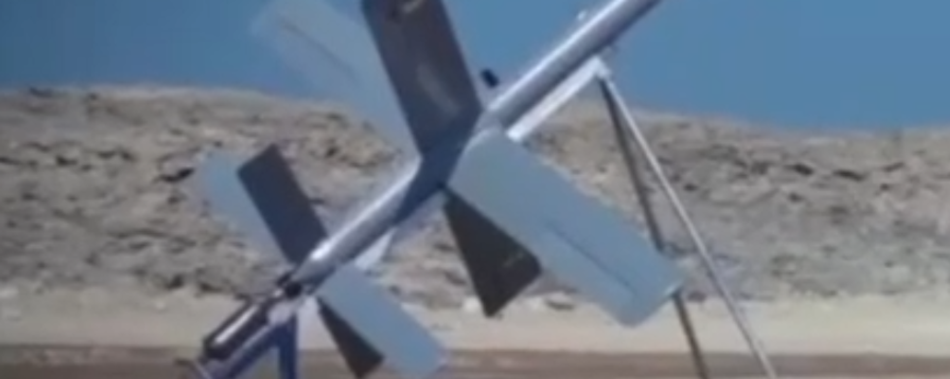 Screenshot of Tasnim video showing new Iranian drone design with wings similar to Russia's distinctive Lancet series of loitering munitions. - Sputnik International, 1920, 28.04.2024