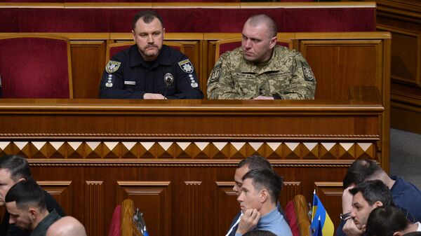 Ukraine's acting Minister of Internal Affairs Ihor Klymenko (L) and acting Head of Security Service of Ukraine Vasyl Maliuk (R), attend a session of the Ukrainian Parliament where deputies will vote on the appointment in Kyiv on February 7, 2023. - Sputnik International