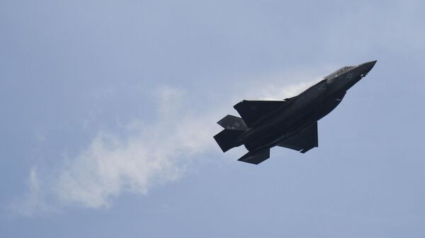A US Marine Corps F-35B Lightning II, a short takeoff and vertical landing (STOVL) version of the Joint Strike Fighter aircraft, flies past during a preview of the Singapore Airshow in Singapore on February 13, 2022 - Sputnik International