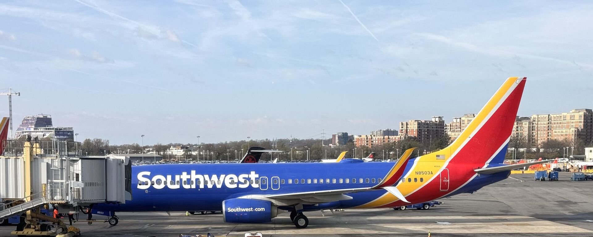 A Southwest Airlines Boeing 737 sits at a gate at Washington's Reagan National Airport (DCA) in Arlington, Virginia, on March 31, 2024. - Sputnik International, 1920, 13.06.2024
