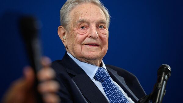 Hungarian-born US investor and philanthropist George Soros looks on after having delivered a speech on the sidelines of the World Economic Forum (WEF) annual meeting, on January 23, 2020 in Davos, eastern Switzerland. (Photo by FABRICE COFFRINI / AFP) - Sputnik International