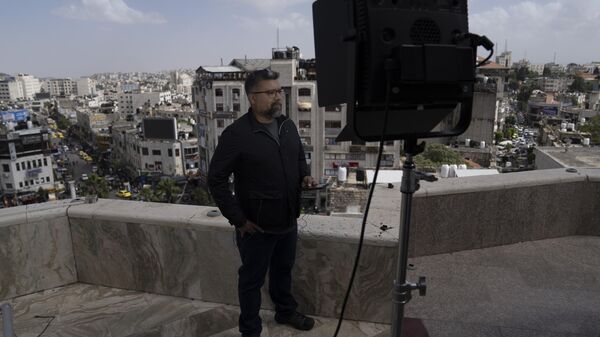 International correspondent of Al Jazeera English Zein Basravi reports live from the network's office in the West Bank city of Ramallah Sunday, May 5, 2024 - Sputnik International